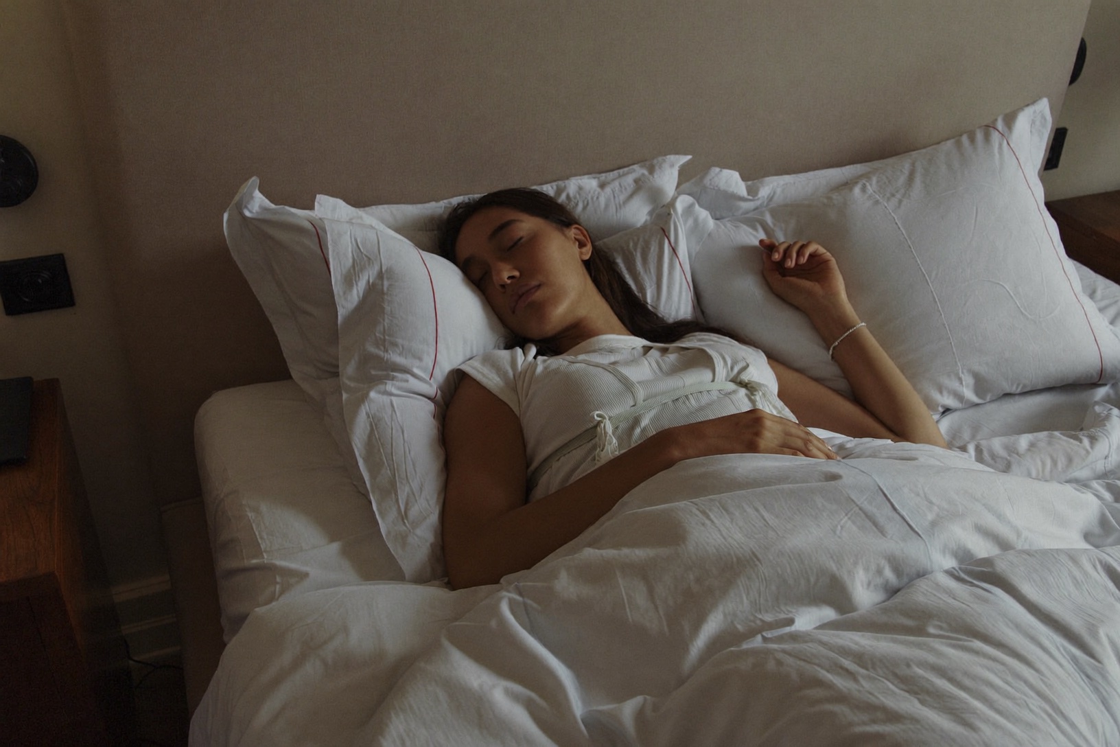 Woman sleeping peacefully in early morning light